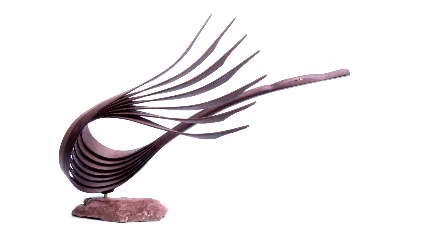 sculpture of abstract bird with white background